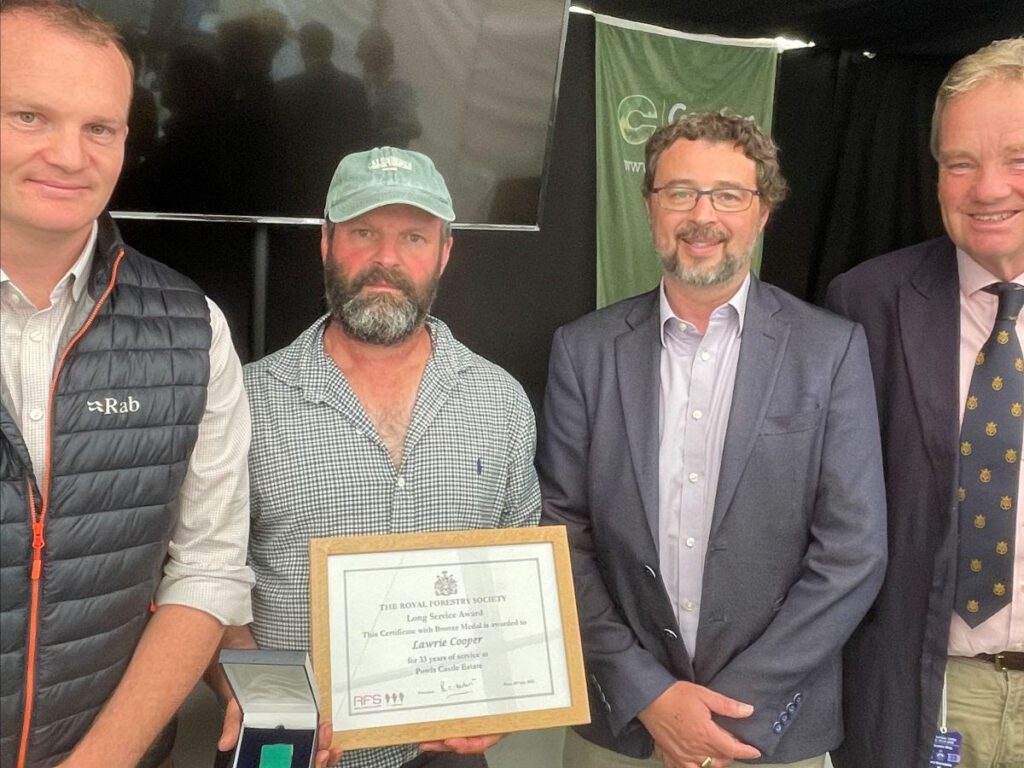 our head forester with a Long Service Award from the Royal Forestry Society